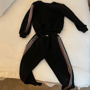 Lola + the Boys black sweatsuit with rainbow stoned stripe